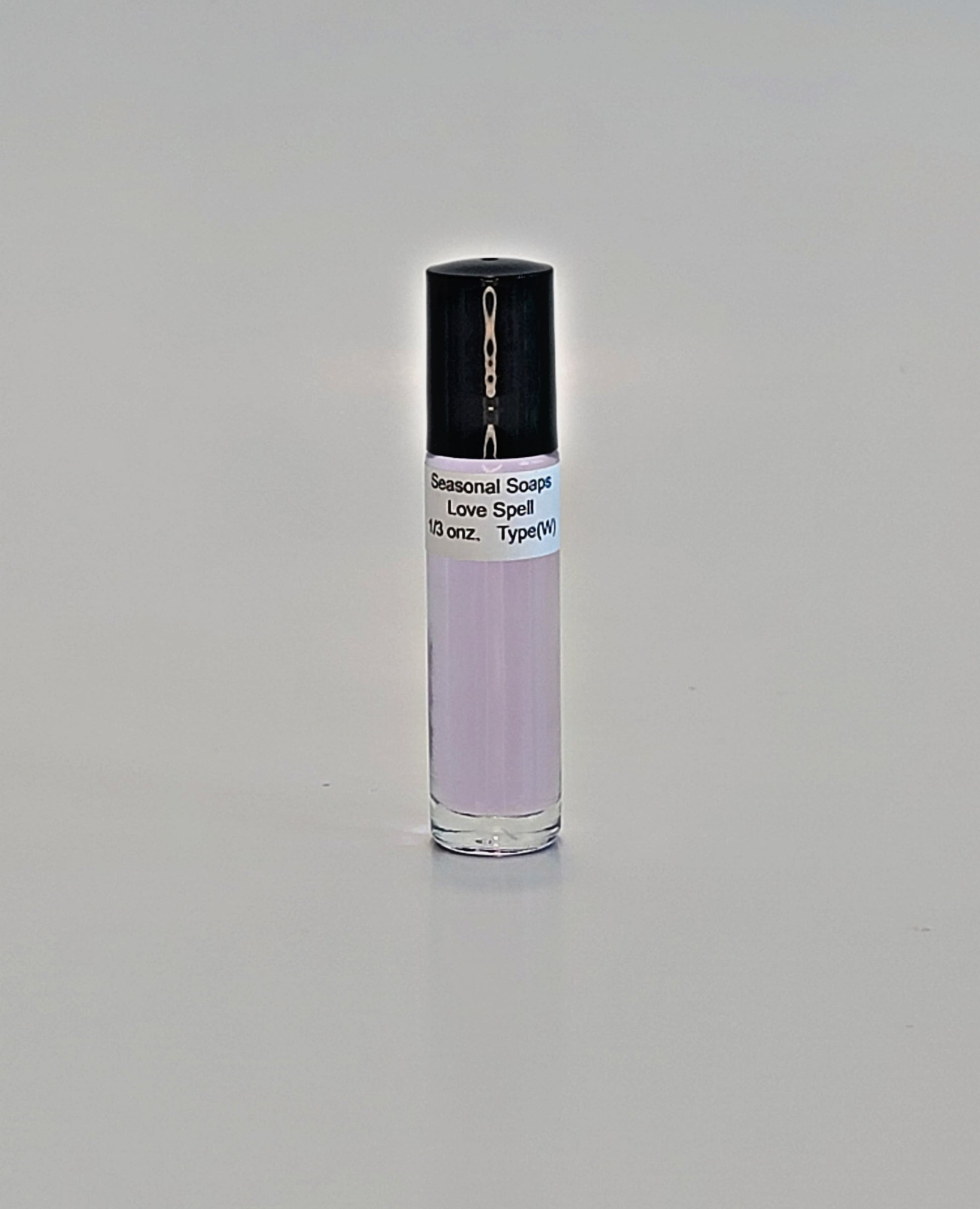 Perfume en aceite Love Spell.